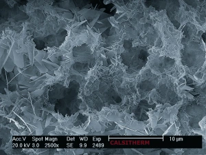 Highly porous Calcium Silicate under the microscope, 93% of the volume is air. Highly porous Calcium Silicate under the microscope, 93% of the volume is air.