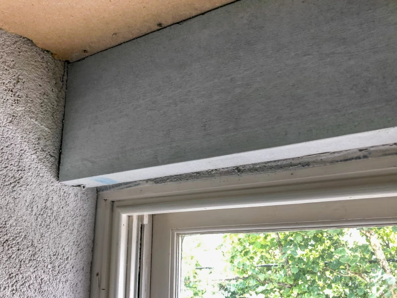 Calsitherm Climate Boards fitted over a window head